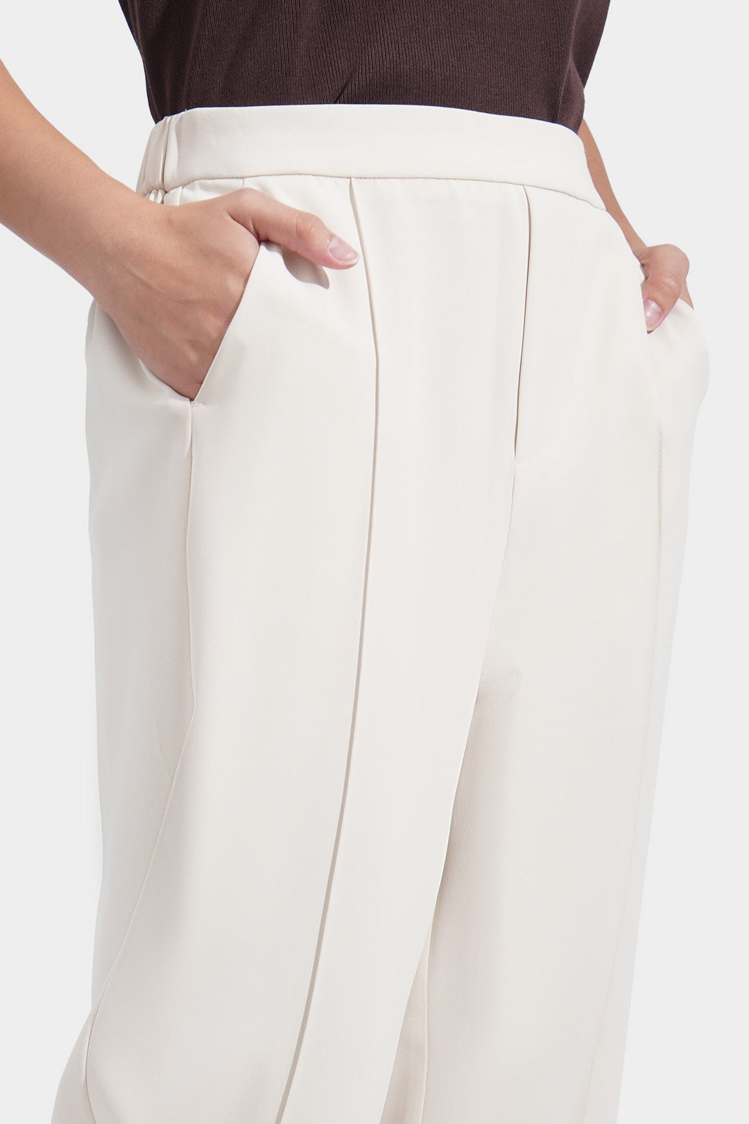 Fine Line: Tapered Pull Up Trousers with Pintuck Detail